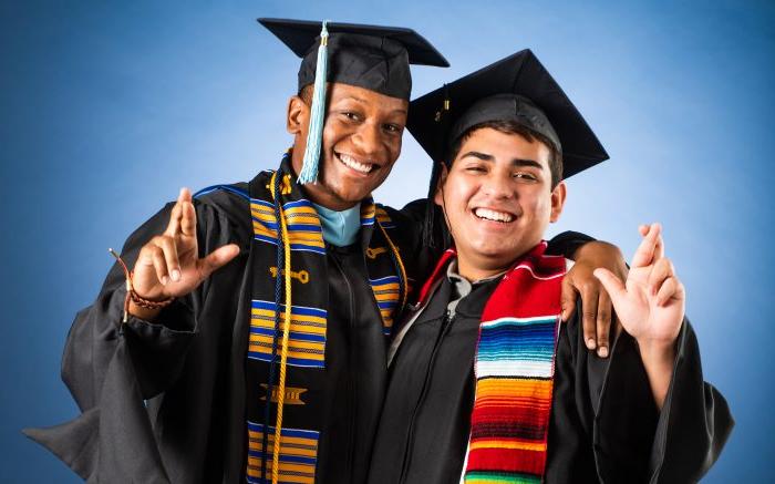 Two TAMUC minority graduates